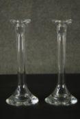 A pair of blown glass candlesticks with conical bases. H.30cm.