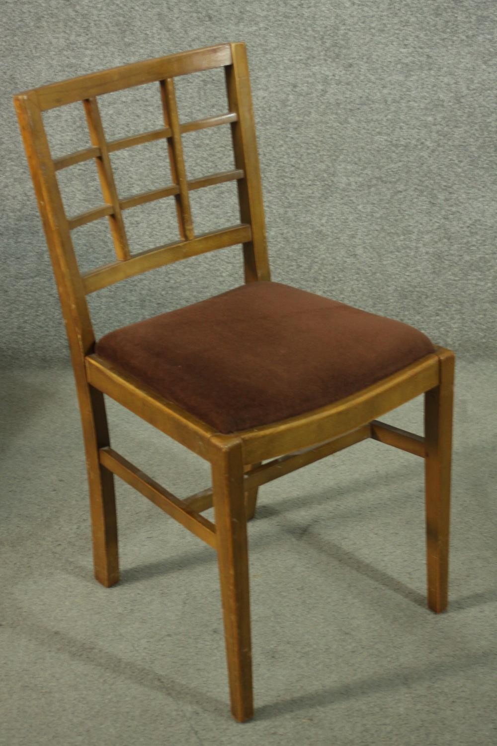A set of vintage Heal's style dining chairs, with lattice backs, over a brown velour drop in seat, - Image 4 of 6