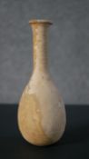A Roman style glass bottle. H.19 W.8cm