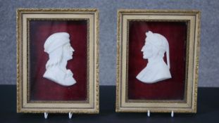 A pair of 19th century framed and glazed Grand Tour carved marble shallow relief portrait busts of