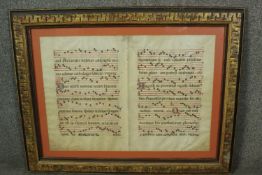 A gilt framed and glazed 16th century original Vellum Latin Gregorian chant double page notation.