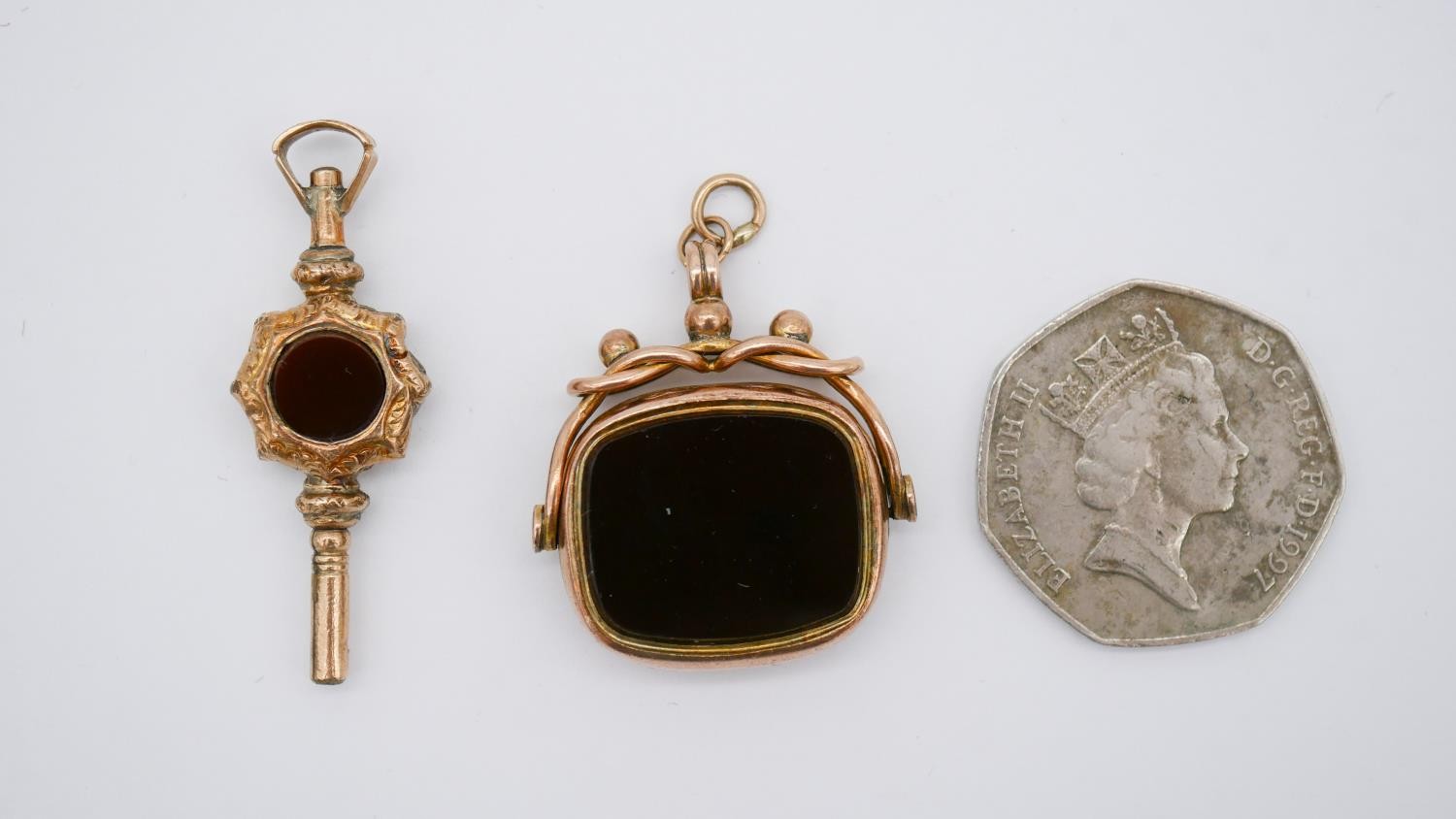 A Victorian 9 carat rose gold sardonyx and agate swivel fob along with an engraved gold plated watch - Image 2 of 13