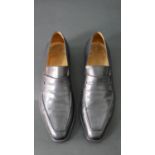 A pair of black leather Berluti Andy loafers in box and dust bags. Size 12.5