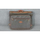 A Mulberry suit carrier in scotchgrain leather. H.60 W.65 D.10cm
