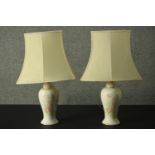 A pair of ceramic baluster form table lamps and a similar marble example. H.63cm (largest)
