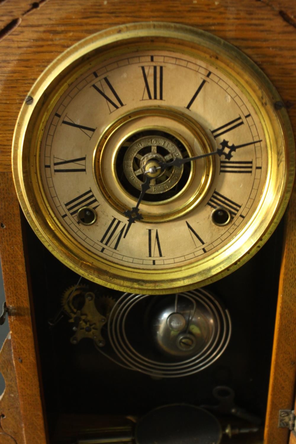 A late 19th century American Ansonia type oak cased mantel clock with eight day movement. H.52 W. - Image 5 of 7