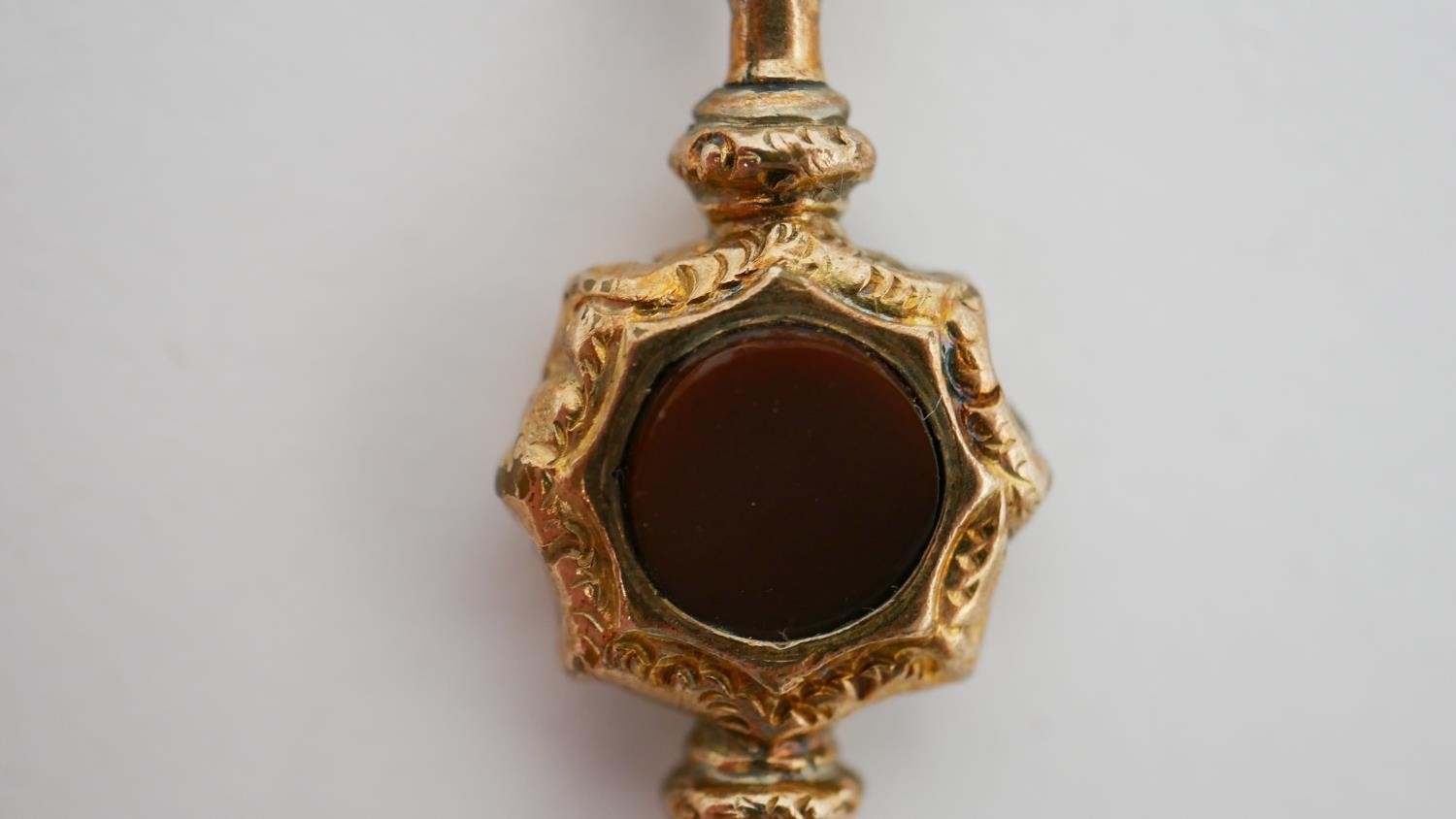 A Victorian 9 carat rose gold sardonyx and agate swivel fob along with an engraved gold plated watch - Image 5 of 13