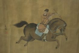 A framed an glazed Chinese watercolour of a warrior on horseback, with artist's seal. H.75 W.98cm