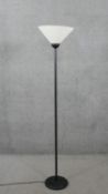 A black metal standard lamp with frosted glass conical shade. H.169 Diam.36cm