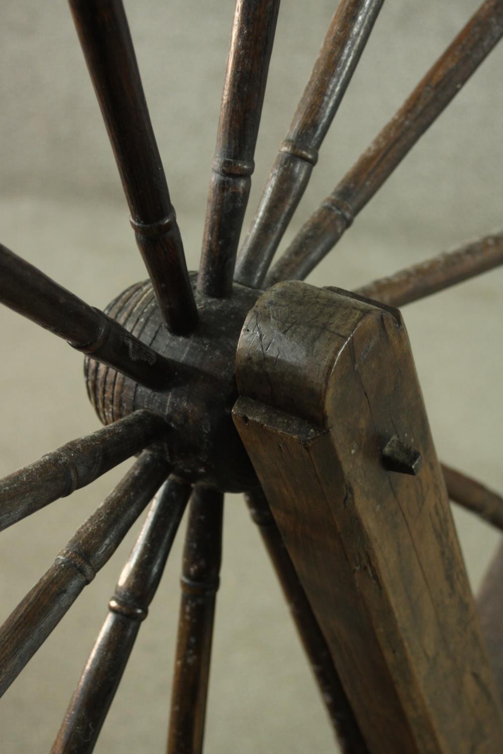 A rustic spinning wheel, possibly Welsh. H.146 W.124 D.43cm. (Wheel: 100cm) - Image 10 of 10