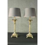 A pair of classical design brass table lamps with foliate detailing and fluted stem. H.69cm.