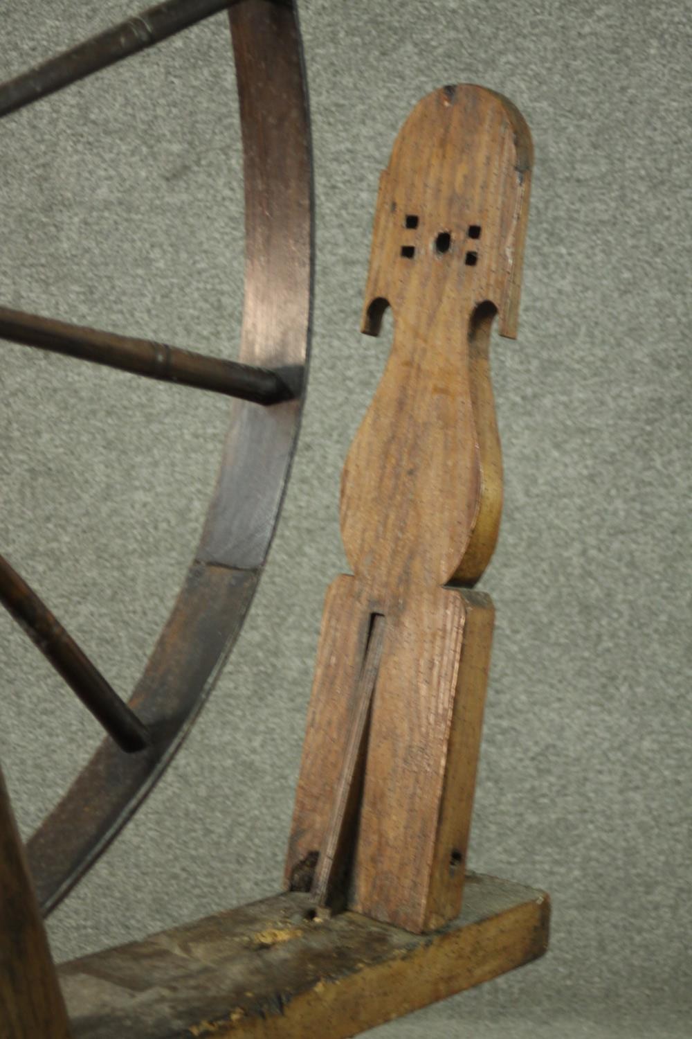 A rustic spinning wheel, possibly Welsh. H.146 W.124 D.43cm. (Wheel: 100cm) - Image 9 of 10