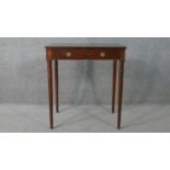 A George III style mahogany side table, the rectangular top with a reeded edge, over a single