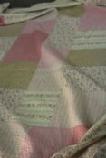Two large rose pattern pastel coloured patchwork quilts. L.270 W.215cm approx.