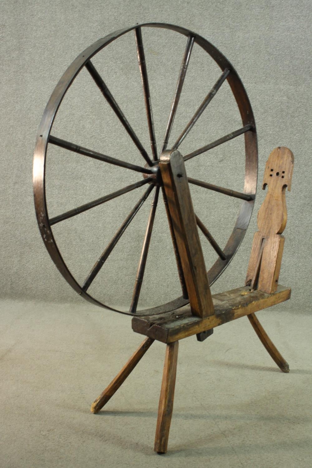 A rustic spinning wheel, possibly Welsh. H.146 W.124 D.43cm. (Wheel: 100cm) - Image 3 of 10