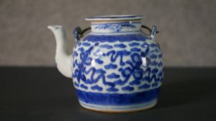 An 18-19th century Chinese blue and white hand painted porcelain tea pot decorated with ceremonial