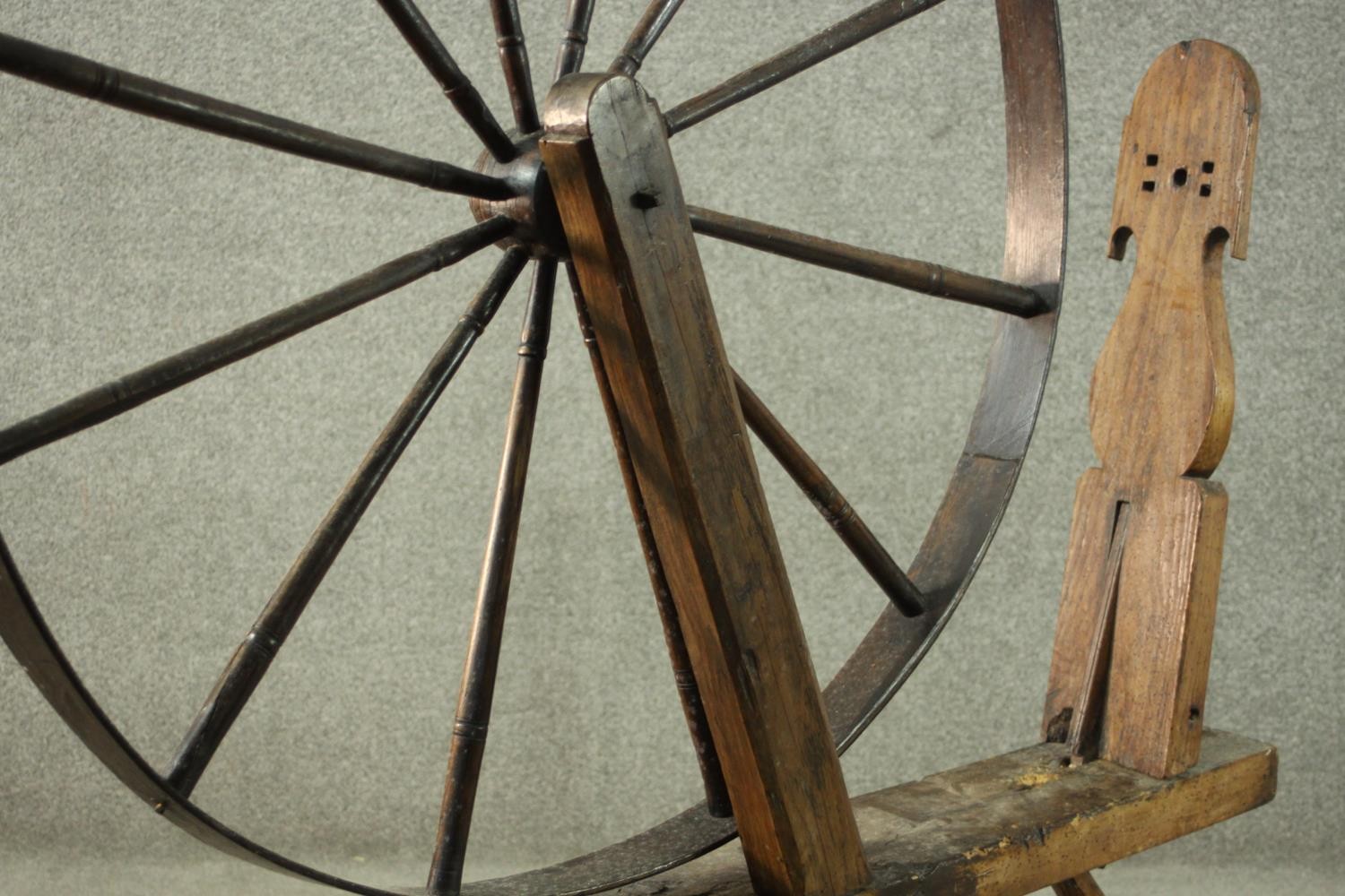 A rustic spinning wheel, possibly Welsh. H.146 W.124 D.43cm. (Wheel: 100cm) - Image 4 of 10