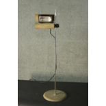 A vintage height adjustable industrial style floor lamp. H.101cm.