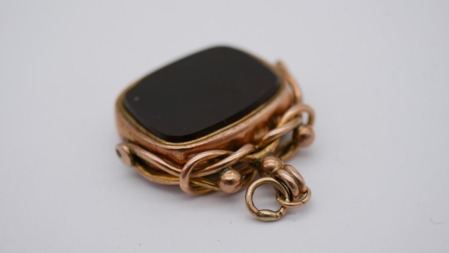 A Victorian 9 carat rose gold sardonyx and agate swivel fob along with an engraved gold plated watch - Image 12 of 13