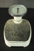 A set of Harrods Limited 'The Knightsbridge' bathroom scales, with a white enamel body, in stones