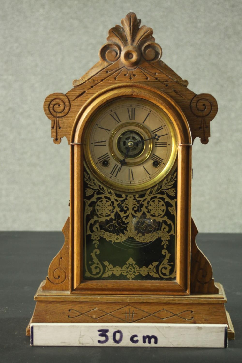 A late 19th century American Ansonia type oak cased mantel clock with eight day movement. H.52 W. - Image 2 of 7