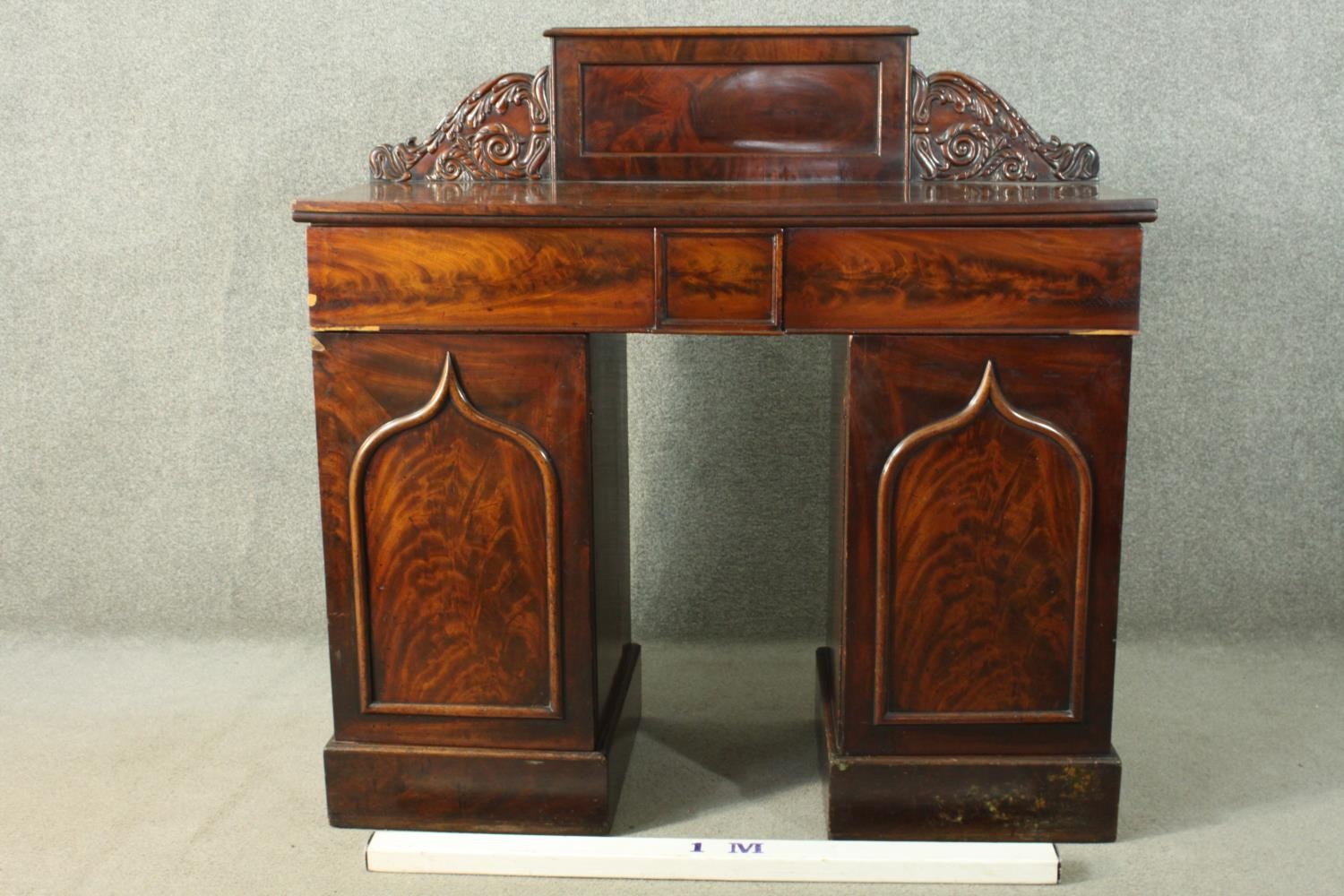 A William IV flame mahogany pedestal sideboard, the rectangular gallery back flanked by ornately - Image 2 of 10