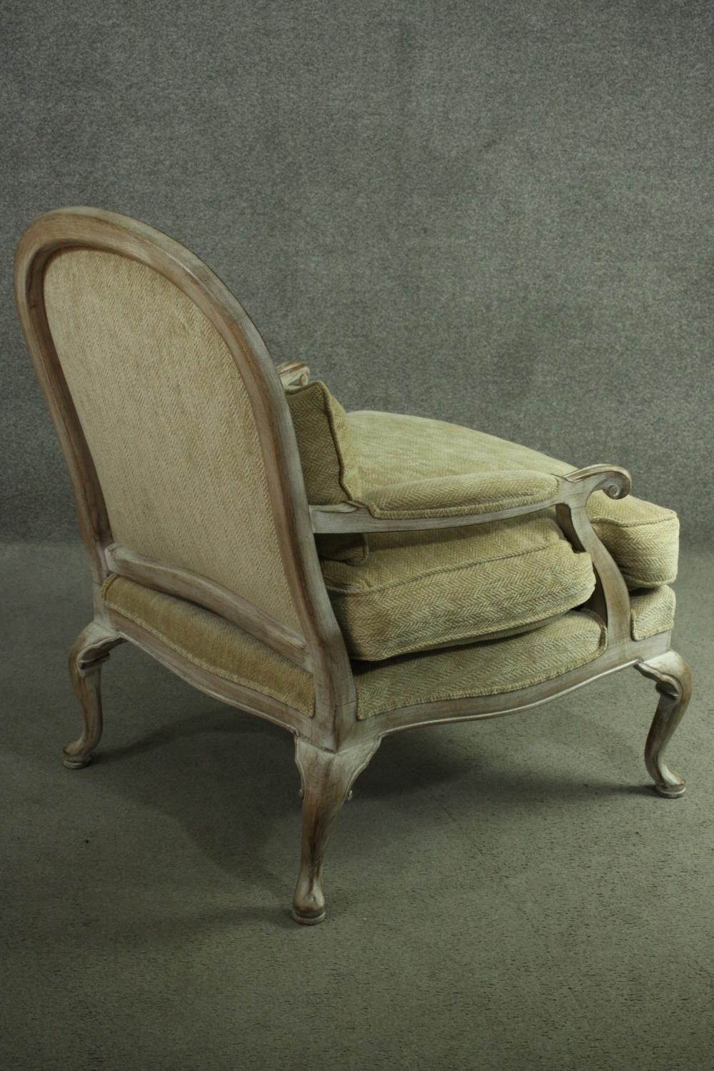 A Louis XV style limed oak fauteuil armchair, with a rounded back, upholstered to the back, arms and - Image 5 of 6
