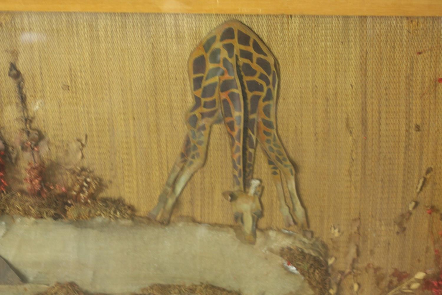 A framed and glazed mixed media collage of African animals at the watering hole. H.49 W.167cm. - Image 3 of 8