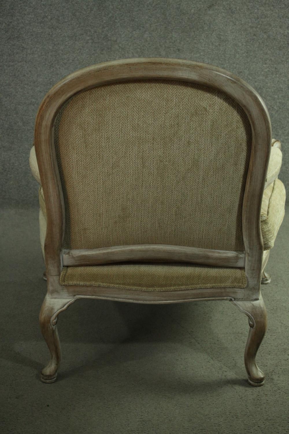 A Louis XV style limed oak fauteuil armchair, with a rounded back, upholstered to the back, arms and - Image 6 of 6
