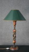 A late 19th century Indian Kashmiri papier-mâché table lamp with floral design and green and gold