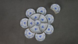 A Herend hand painted blue Chinese Bouquet design twelve person part serving set with crescent