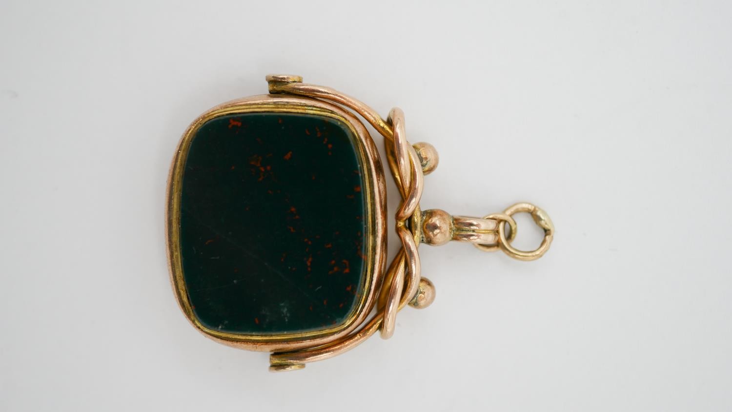 A Victorian 9 carat rose gold sardonyx and agate swivel fob along with an engraved gold plated watch - Image 9 of 13