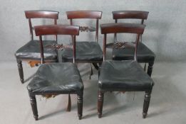 A set of five William IV mahogany bar back dining chairs, with a carved stylized fern backrest