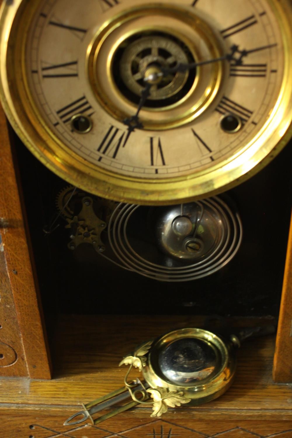 A late 19th century American Ansonia type oak cased mantel clock with eight day movement. H.52 W. - Image 6 of 7