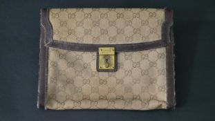 A vintage Gucci clutch handbag, marked Gucci, with dust bag. H.20 W.26cm