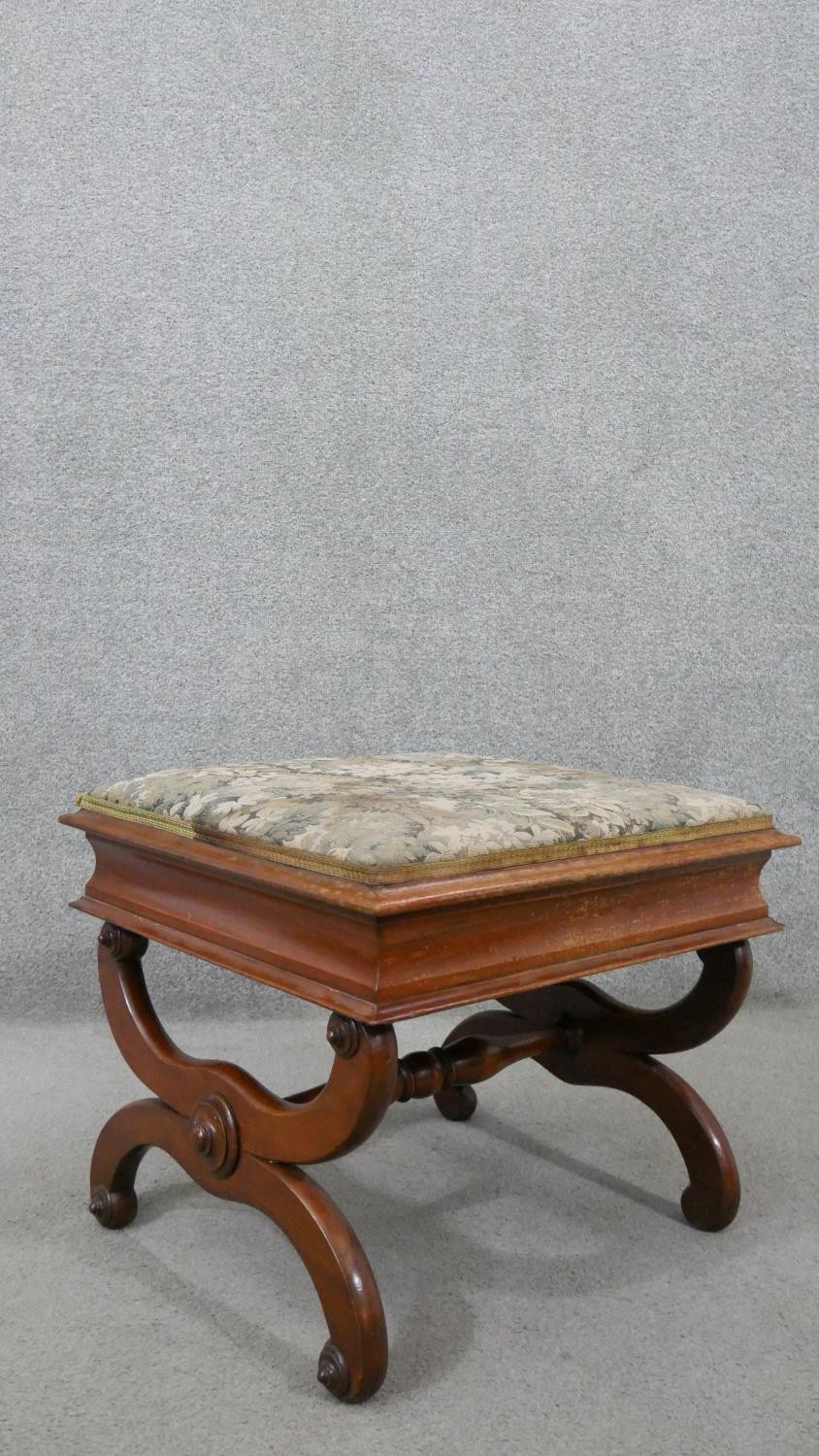 A Victorian walnut piano stool, the rising lid upholstered in machine made tapestry, on curved X - Image 6 of 6