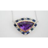 A white and yellow metal (tests as platinum and 18 carat gold) amethyst, sapphire and diamond