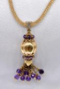 An Italian Sun Day 18 carat yellow gold and amethyst tassel pendant with 18 carat mesh chain. The