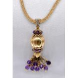 An Italian Sun Day 18 carat yellow gold and amethyst tassel pendant with 18 carat mesh chain. The