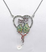 A silver and Plique-à-jour enamel mother and kitten necklace with rope chain. The heart shaped