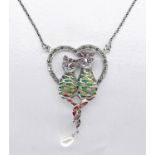 A silver and Plique-à-jour enamel mother and kitten necklace with rope chain. The heart shaped