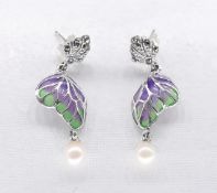 A pair of silver and Plique-a-jour enamel butterfly wing earrings. The tops studded with marcasite