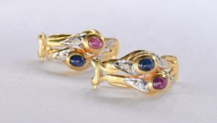 A pair of vintage abstract design 18 carat yellow gold, ruby, sapphire and diamond earrings. Each