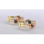 A pair of vintage abstract design 18 carat yellow gold, ruby, sapphire and diamond earrings. Each