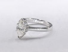 A white metal (tests as 18 carat) marquise diamond solitaire ring. Set to centre with a marquise