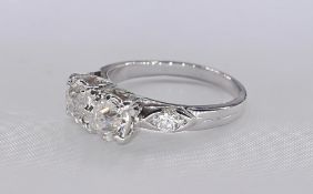 A white metal (tests as 14 carat white gold) and old mine diamond two stone ring. Set to centre with