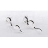 A pair of cotemporary polished silver snake stud earrings with butterflies. Stamped 925.