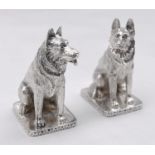 A pair of novelty German Shepherd form silver salt and pepper shakers. Engraved detailing on the fur