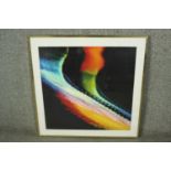 A framed and glazed colourful abstract print. H.70 W.67cm.