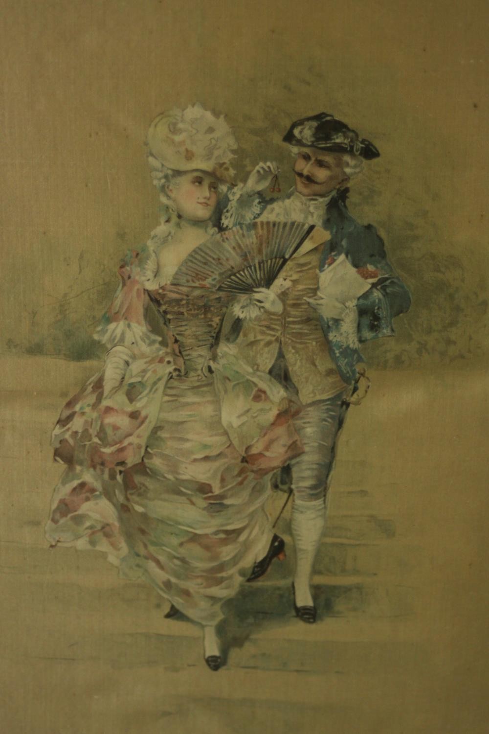 A gilt framed and glazed print on silk of a young couple in best dress. H.48 40cm.